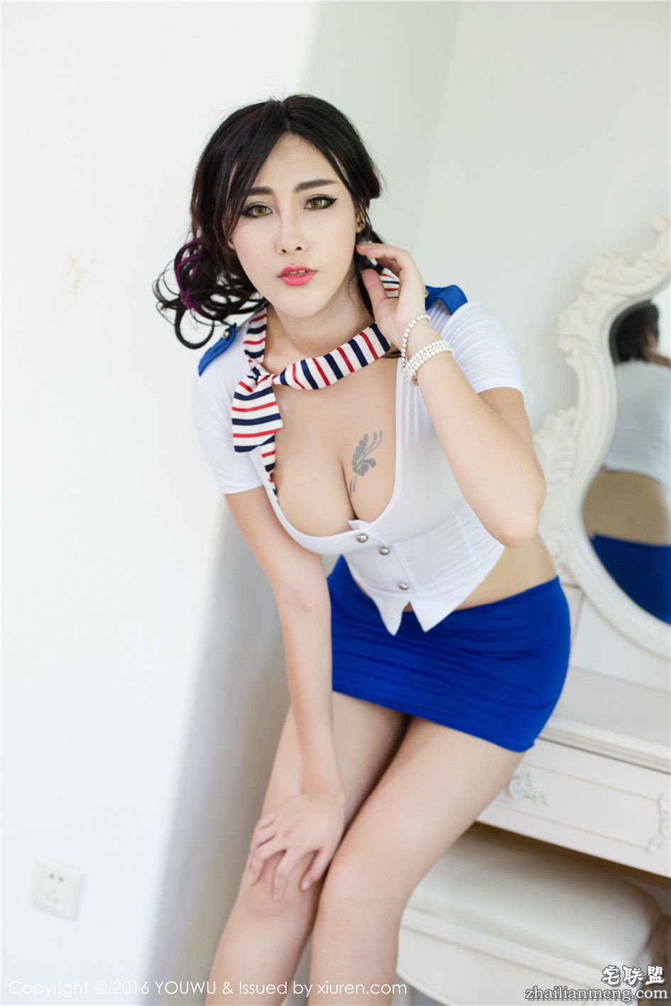 [尤物馆] 性感爆乳模特FoxYini孟狐狸空姐制服的诱惑 VOL.031第6张